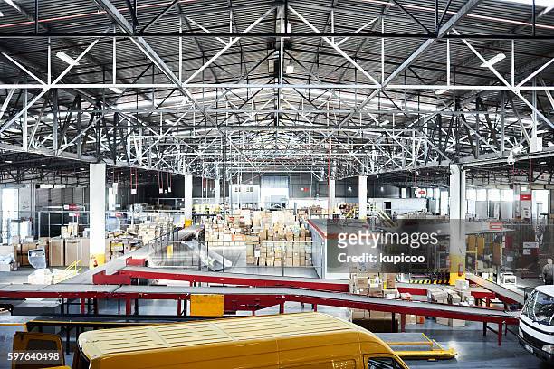 shipping is a large scale operation - distribution warehouse stock pictures, royalty-free photos & images