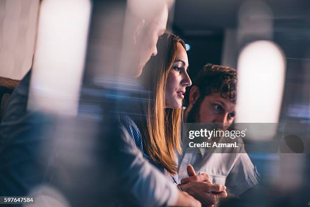 catching the deadlines - three young women stock pictures, royalty-free photos & images