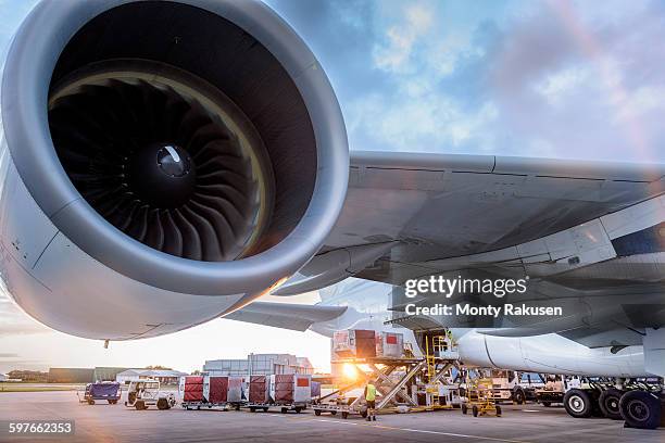 ground crew loading a380 aircraft at sunset - ground crew stock pictures, royalty-free photos & images