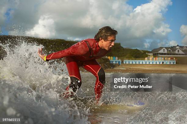 teenage boy, surfing - bude cornwall stock pictures, royalty-free photos & images