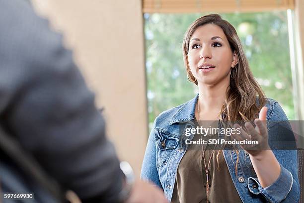 woman explains something to her therapist - unhappy customer stock pictures, royalty-free photos & images