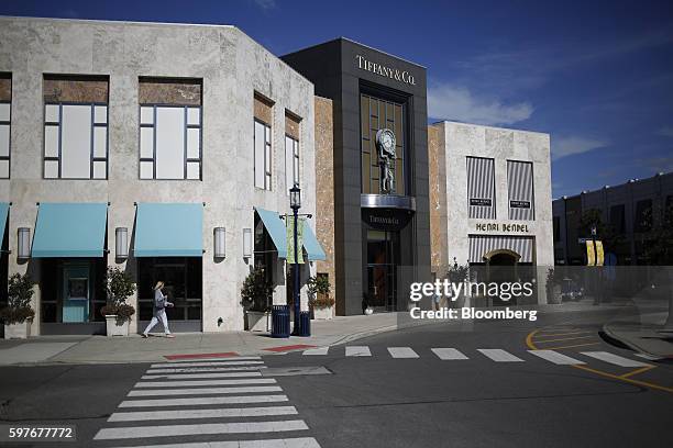 Pedestrians walk through the Easton Town Center shopping mall in Columbus, Ohio, U.S., on Tuesday, Aug. 23, 2016. The Conference Board is scheduled...