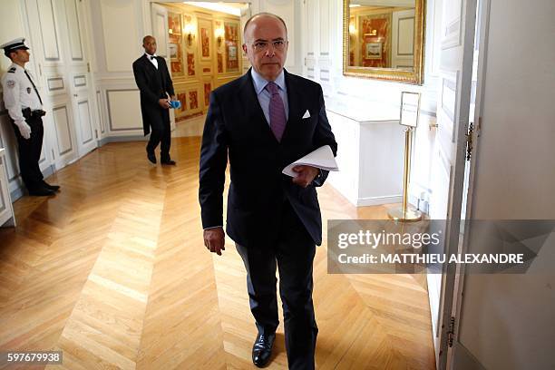 French Minister of Interior Bernard Cazeneuve arrives for a press conference following a meeting with representatives of the Islamic community in...