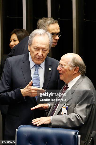 Brazilian judge and the current president of the Supreme Federal Court of Brazil Enrique Ricardo Lewandowski speaks with jurist Miguel Reale Junior...