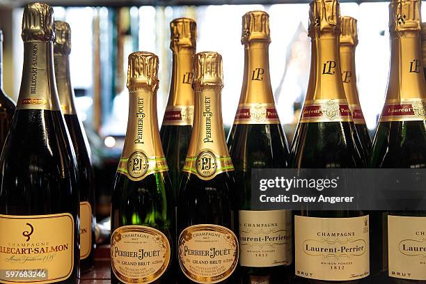 Bottles of Champagne for sale sit on the shelf at Astor Wines & Spirits, August 29, 2016 in New York City. The Champagne region in France has been...
