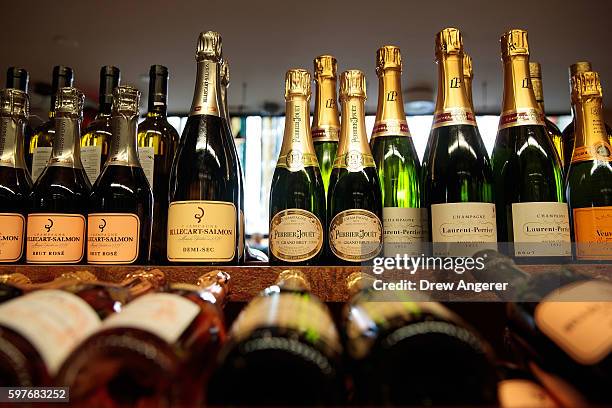 Bottles of Champagne for sale sit on the shelf at Astor Wines & Spirits, August 29, 2016 in New York City. The Champagne region in France has been...