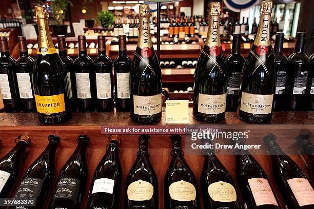 Bottles of Champagne for sale sit on the shelf at Astor Wines & Spirits, August 29, 2016 in New York City. The Champagne region in France has been...