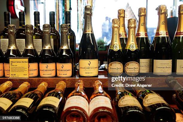 Bottles of Champagne for sale sit on the shelf at Astor Wines & Spirits, August 29, 2016 in New York City. The Champagne region in France has been...