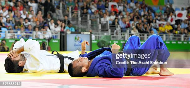Masashi Ebinuma of Japan reacts after beating Antoine Bouchard of Canada in the Men's -66kg bronze medal B final on Day 2 of the Rio 2016 Olympic...