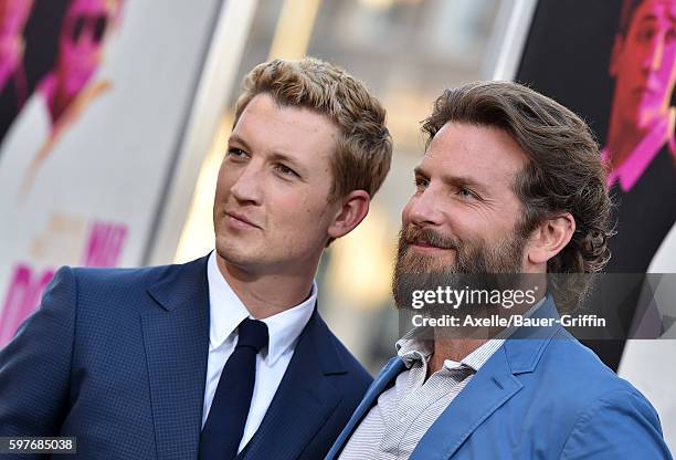 Actors Miles Teller and Bradley Cooper arrive at the premiere of Warner Bros. Pictures' 'War Dogs' at TCL Chinese Theatre on August 15, 2016 in...