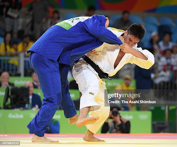 Marc Odenthal of Germany competes against Mashu Baker of Japan during a Men's-90kg bout on Day 5 of the Rio 2016 Olympic Games at Carioca Arena 2 on...