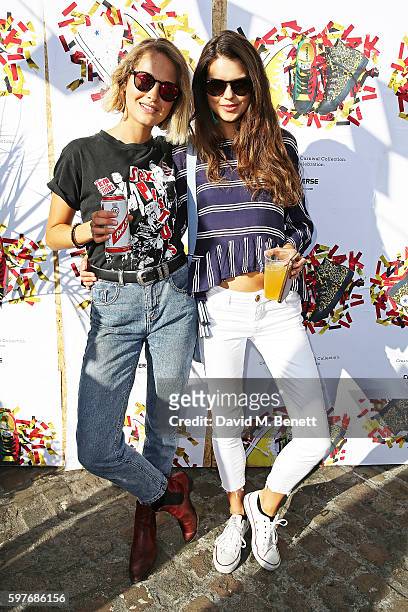 Tess Ward and Sarah Ann Macklin attend the Converse party at Notting Hill Carnival to celebrate the new carnival inspired Converse Custom Chuck...
