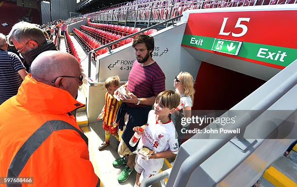 Fans of Liverpool at the main stand test event at Anfield on August 29, 2016 in Liverpool, England.