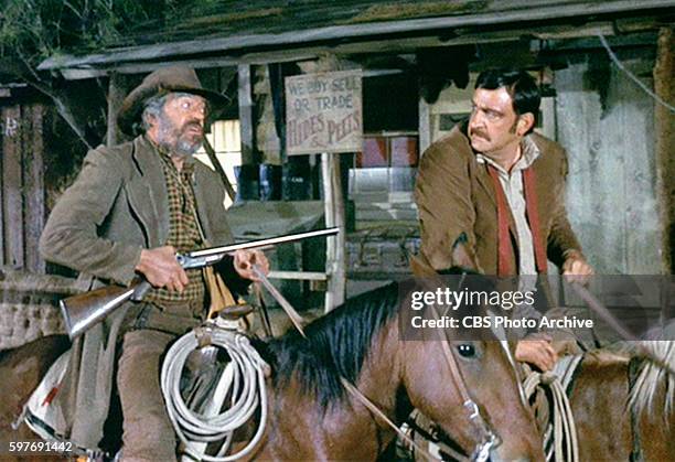 Theatrical movie originally released December 18, 1970. Film directed by Howard Hawks. Pictured left to right, Jack Elam , and Victor French . Image...