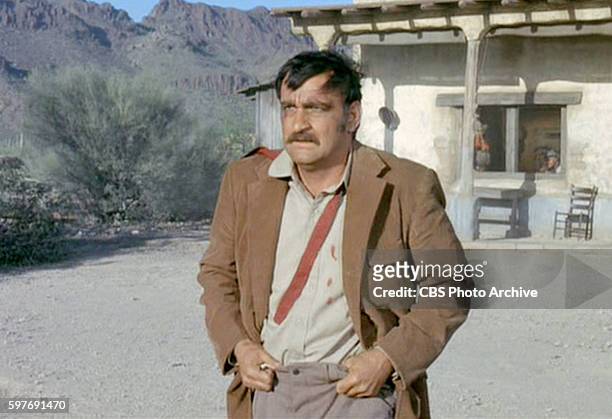 Theatrical movie originally released December 18, 1970. Film directed by Howard Hawks. Pictured, Victor French , during a hostage swap. Image is a...