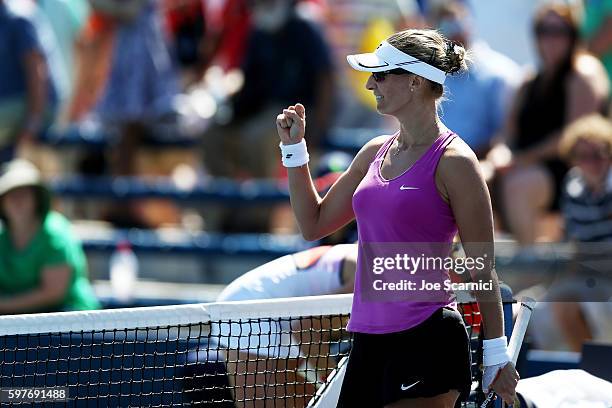 Mirjana Lucic-Baroni of Croatia celebrates her win over Alizé Cornet of France in her first round Women's Singles match on Day One of the 2016 US...