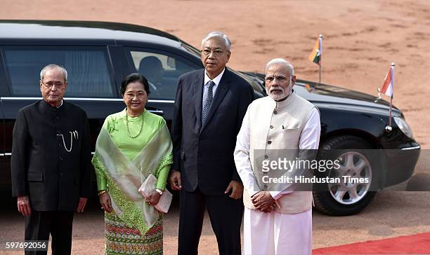 Myanmar's President Htin Kyaw and his wife Su Su Lwin are received by Indian Prime Minister Narendra Modi and Indian President Pranab Mukherjee...