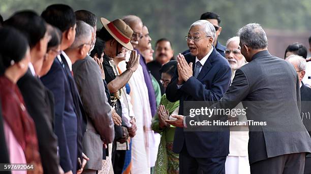 Myanmar's President Htin Kyaw meets Army Chief Dalbir Singh during his ceremonial reception at the forecourt of Indian President's palace on August...