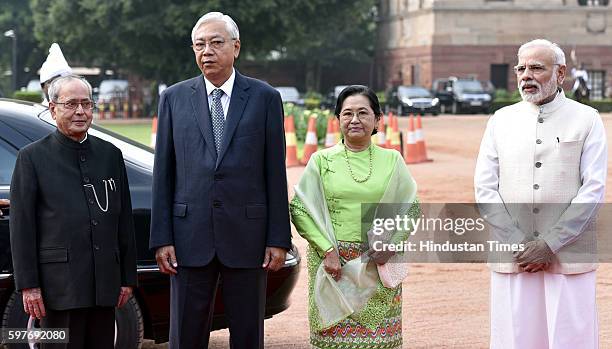 Myanmar's President Htin Kyaw and his wife Su Su Lwin are received by Indian Prime Minister Narendra Modi and Indian President Pranab Mukherjee...