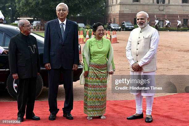 Myanmar's President Htin Kyaw and his wife Su Su Lwin are received by Indian Prime Minister Narendra Modi and Indian President Pranab Mukherjee...