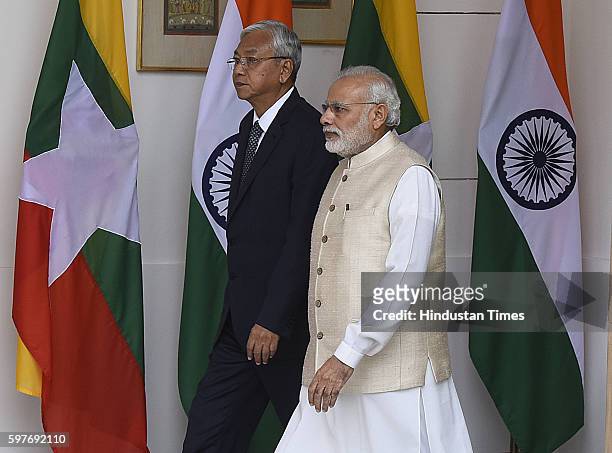 Prime Minister Narendra Modi with the President of the Republic of the Union of Myanmar U Htin Kyaw arrives at Hyderabad House on August 29, 2016 in...