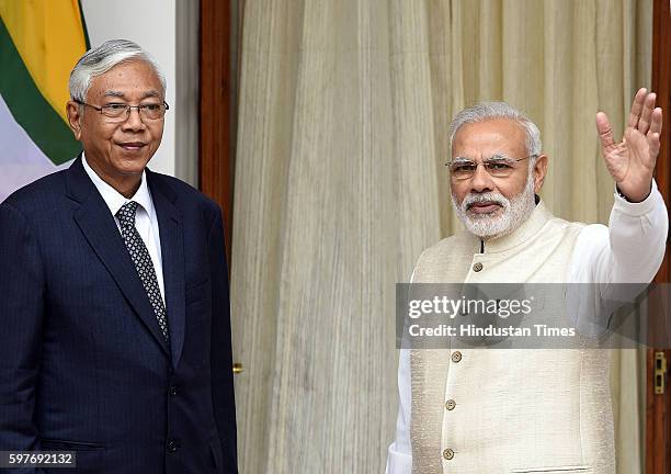 Prime Minister Narendra Modi with the President of the Republic of the Union of Myanmar U Htin Kyaw before signing an agreement at a press conference...