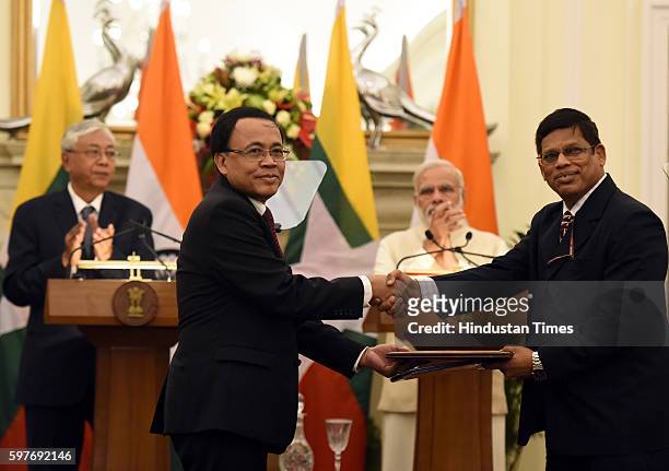 Prime Minister Narendra Modi and the President of Myanmar Htin Kyaw witnessing the exchange of the agreements at Hyderabad House on August 29, 2016...