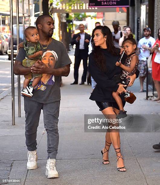 Kim Kardashian, Kanye West with North West and Saint West are spotted in the Upper East Side on August 29, 2016 in New York City.