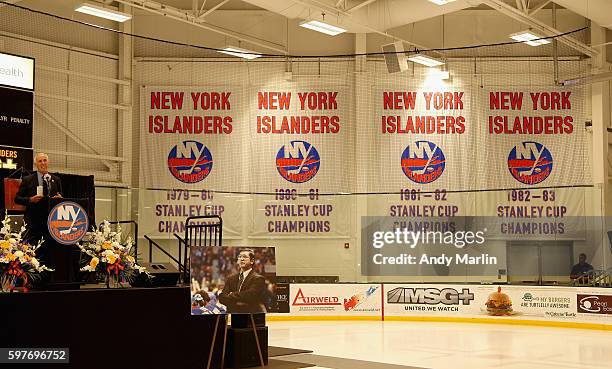 New York Islanders former player and member of the HHOF Mike Bossy addresses the guests during the New York Islanders memorial service for Al Arbour...