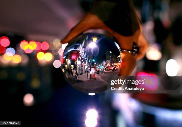 oxford street at night through a crystal ball - anatoleya stock pictures, royalty-free photos & images