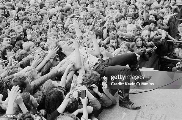 Singer Bono performing with Irish rock group U2, Gateshead, July 1982.