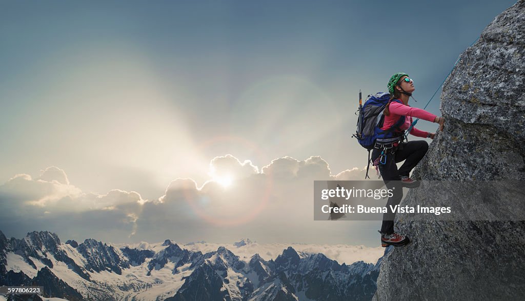 Female climber on a rocky wall