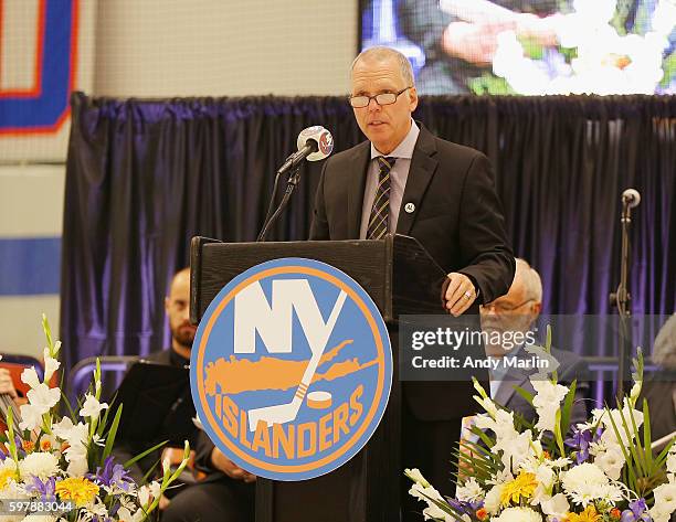 New York Islanders scout Mario Saraceno addresses the guests during the New York Islanders memorial service for Al Arbour on August 29, 2016 in East...