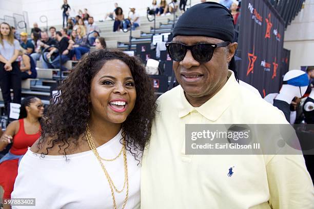 Actress Breley Evans and Singer/Songwriter Stevie Wonder attend the 4th Annual Kailand Obasi Hoop-Life Fundraiser at USC Galen Center on August 28,...