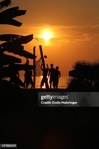 at the beach - beach volleyball night stock pictures, royalty-free photos & images