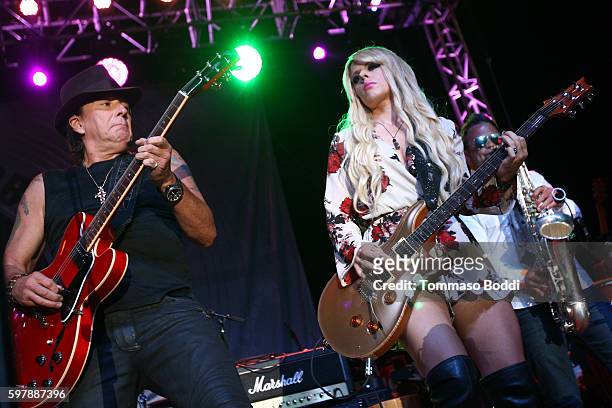 Musicians Richie Sambora and Orianthi perform on stage during the 9th Annual Medlock Krieger Celebrity Invitational And All Star Concert Benefiting...