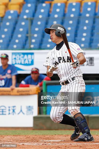 Kento Fujishima of Japan hits a two base hit in the bottom of the fifth inning in the game between Japan and Hong Kong during the 11th BFA U-18...