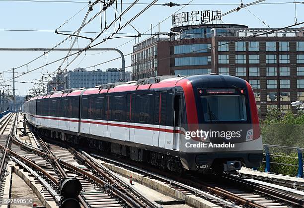 China's first permanent magnet subway train, which saves up to 30 percent energy compared to traditional trains, goes into service in Changsha,China...