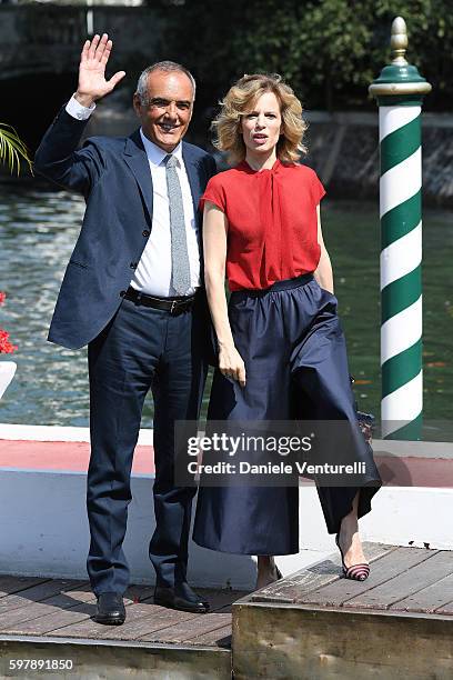 Director of the festival Alberto Barbera and Festival hostess Sonia Bergamasco arrive at Lido during the 73rd Venice Film Festival on August 30, 2016...