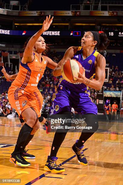Candace Parker of the Los Angeles Sparks handles the ball against Mistie Bass of the Phoenix Mercury on August 28, 2016 at Talking Stick Resort Arena...