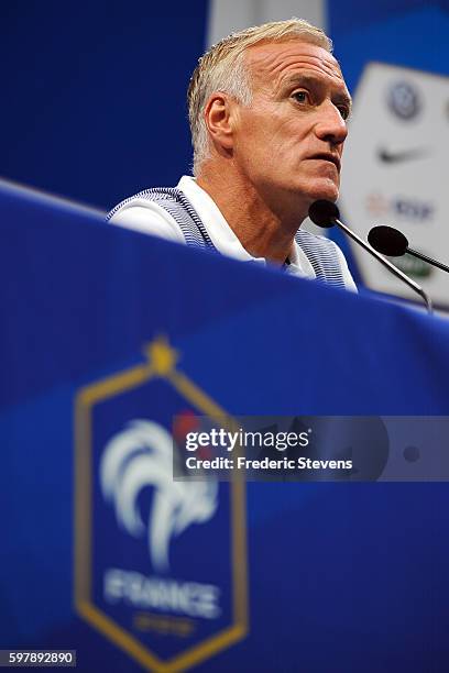 French Football Team head coach Didier Deschamps looks on as he takes part in training session on August 29, 2016 in Clairefontaine, France. It's the...