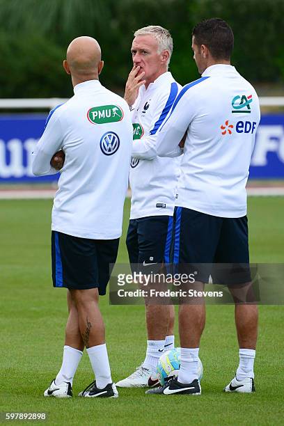 French Football Team head coach Didier Deschamps looks on as he takes part in training session on August 29, 2016 in Clairefontaine, France. The...