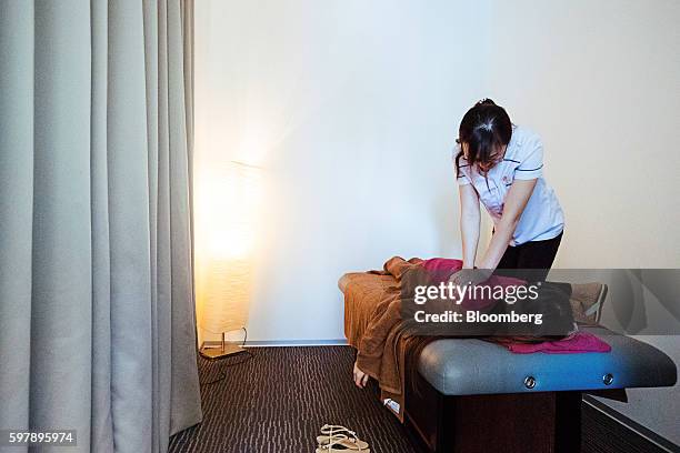 An employee receives a complimentary message at the Garena Interactive Holding Ltd. Headquarters in Singapore, on Thursday, Aug. 25, 2016. Garena, a...