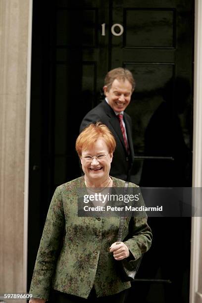 Finnish President Tarja Halonen smiles after saying goodbye to British Prime Minister Tony Blair after a meeting at 10 Downing Street, London, May...