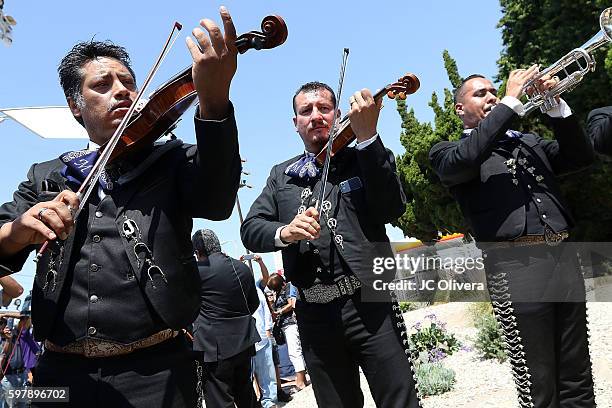 Fans of the late Mexican singer/songwriter Juan Gabriel gather to pay respect outside of Malinow & Silverman Mourtuary at Malinow & Silverman...