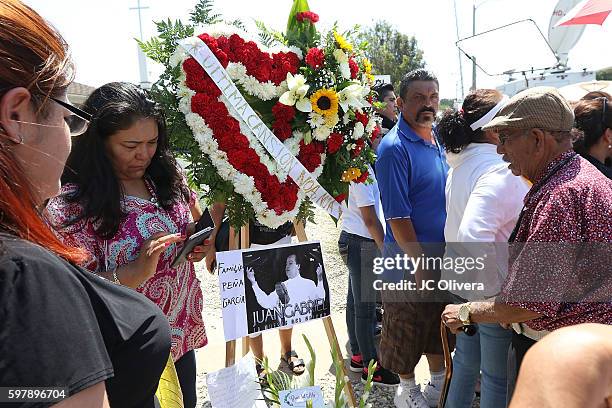 Fans of the late Mexican singer/songwriter Juan Gabriel gather to pay respect outside of Malinow & Silverman Mourtuary at Malinow & Silverman...