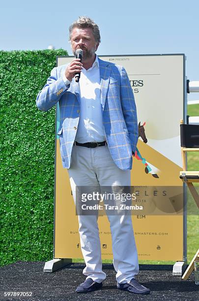 Founder and CEO Christophe Ameeuw speaks at Longines Masters of Los Angeles preview at Shoreline Aquatic Park at Long Beach Harbor Lighthouse on...