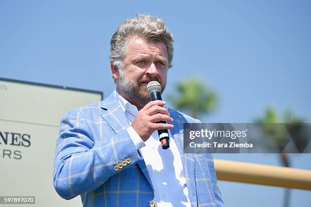 Founder and CEO Christophe Ameeuw speaks at Longines Masters of Los Angeles preview at Shoreline Aquatic Park at Long Beach Harbor Lighthouse on...