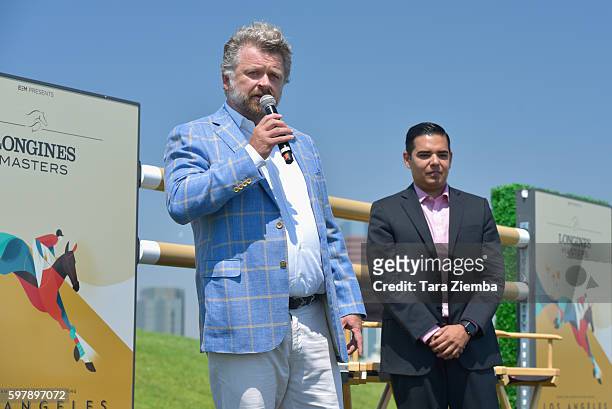 Founder and CEO Christophe Ameeuw and Long Beach Mayor Robert Garcia attend Longines Masters of Los Angeles preview at Shoreline Aquatic Park at Long...