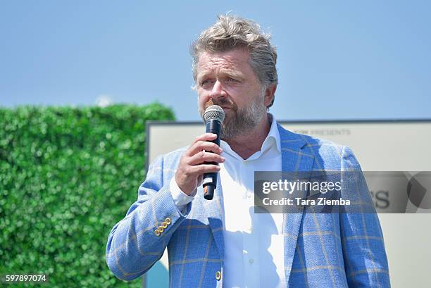 Founder and CEO Christophe Ameeuw speaks at Longines Masters of Los Angeles preview at Shoreline Aquatic Park at Long Beach Harbor Lighthouse on...